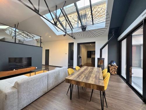 Downtown Villa | Magnifique loft industriel-chic avec patio