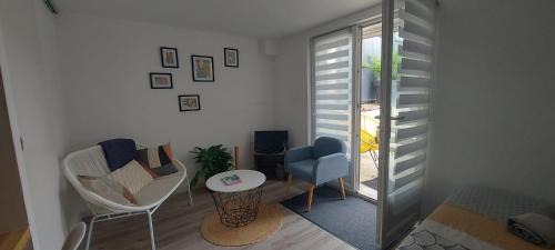 Ecouflant Apartment | Studio cosy
