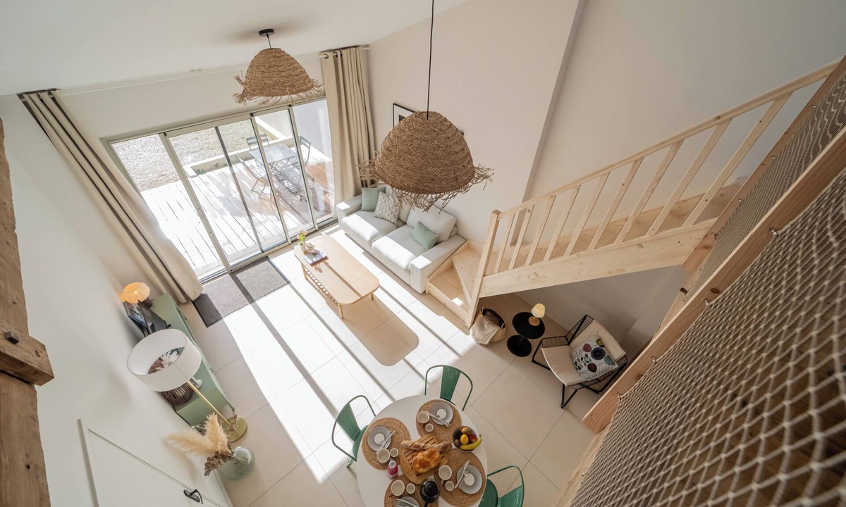 Saintes Apartment | Two new, adjoining lofts in a former cannery: terraces and parking.
