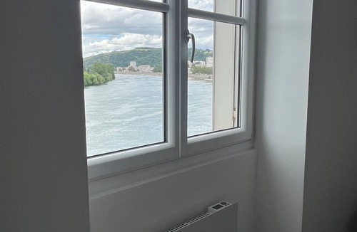 Vienne Apartment | Apartment overlooking the Rhône, in the 17th-century Commanderie des Antonins.