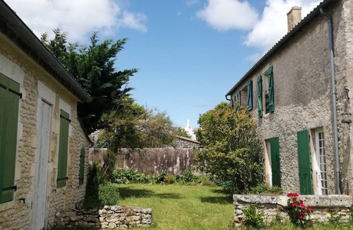 Loix House | CHARACTERFUL HOME: Accommodates up to 17 people; 5 bedrooms, 5 bathrooms