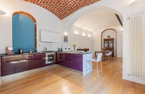 Cit Turin Apartment | Charming Colorful Brick by Wonderful Italy