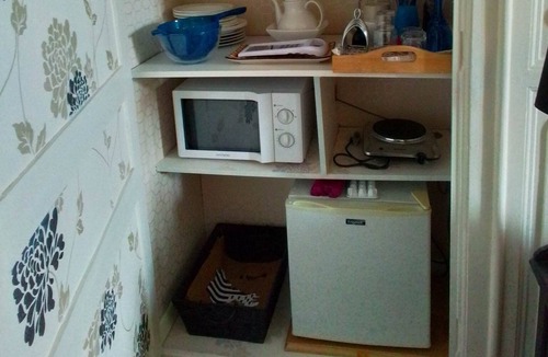 Cast Apartment | Deluxe Studio room, with kingsize bed and roll top bath.