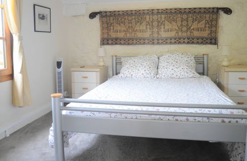 Montpezat-de-Quercy Cottage | La Petite Maison is located in beautiful restful surroundings with swimming pool