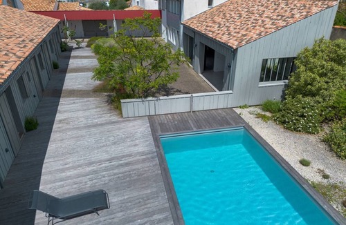 Loix House | Large architect-designed house with swimming pool and yoga studio