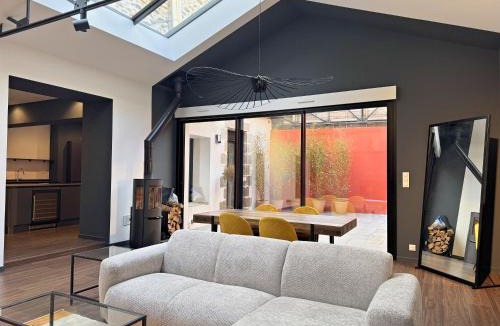 Downtown Villa | Magnifique loft industriel-chic avec patio