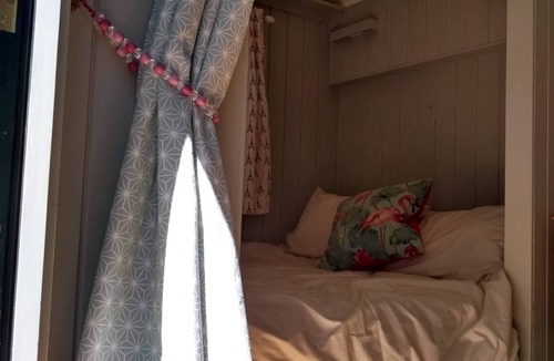 Busserolles Cabin | Romantic riverfront shepherds' hut with outdoor kitchen w/firepit