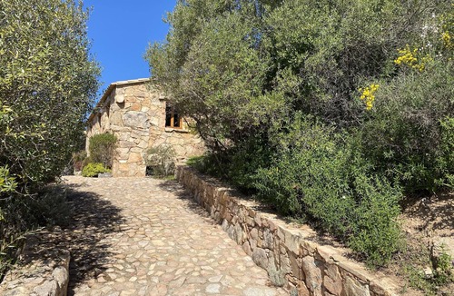 Figari House | Secluded, contemporary sheepfold for 2, nestled on a hillside with swimming pool.