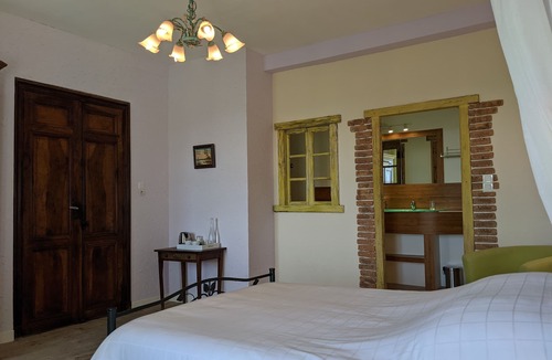 Montaillou Bed & Breakfast | Spacious guest room with mountain views
