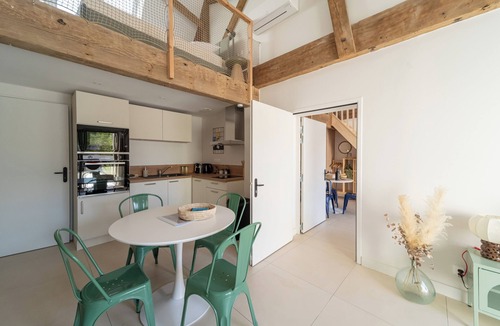 Saintes Apartment | Two new, adjoining lofts in a former cannery: terraces and parking.