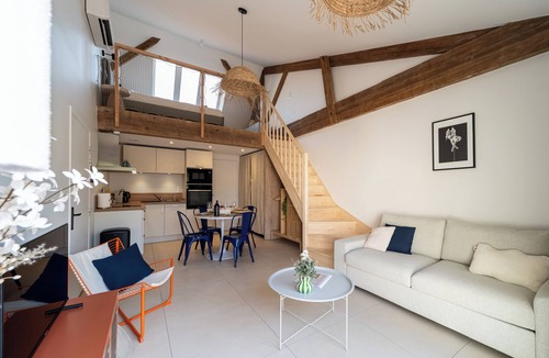 Saintes Apartment | Two new, adjoining lofts in a former cannery: terraces and parking.