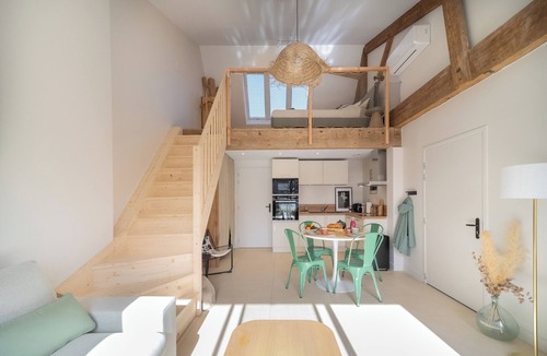 Saintes Apartment | Two new, adjoining lofts in a former cannery: terraces and parking.