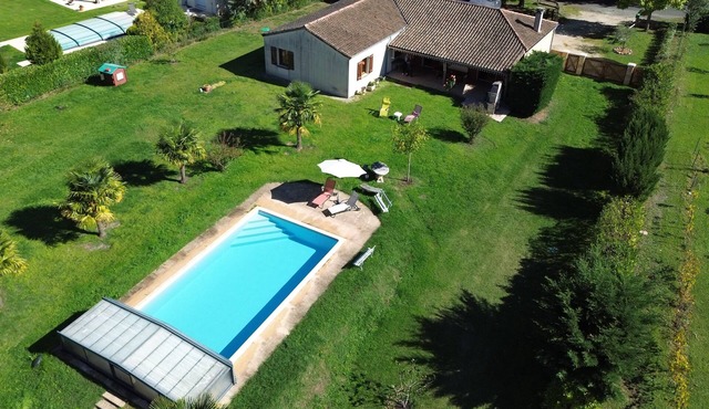 A modern, spacious, detached house with private covered pool and fenced garden