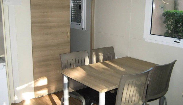 Flower Camping le Pilon d'Agel * - Chalet Némo Confort 3 rooms 4 people Air-conditioned