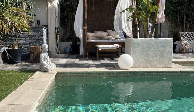 House with a pool and spa