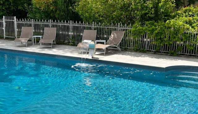 Large luxurious house with heated pool & stunning views in a picturesque village