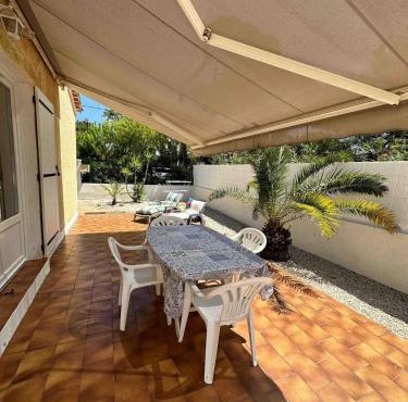 Maison de plage avec jardin clos