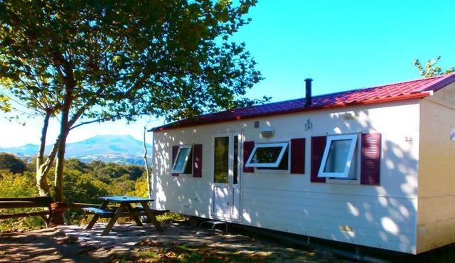 mobile cottage on a hill with views