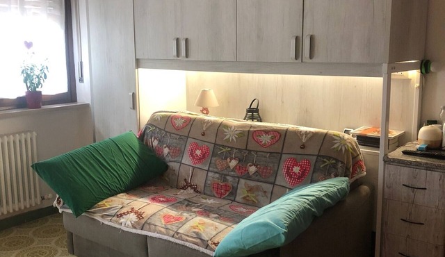 Studio Apartment 'L'oasi Dei Larici' with Shared Garden and Balcony